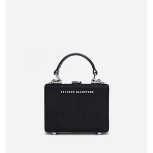Brandon Blackwood calf hair mini trunk purse